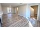 Spacious living room with wood-look floors and neutral walls at 2759 Kerri Pl, Lithia Springs, GA 30122