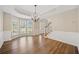 Formal dining room featuring hardwood floors and a chandelier at 4400 Bellwood Cir, South Fulton, GA 30349