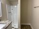 Bathroom with shower/tub combo and granite vanity at 1415 Chedworth, Stone Mountain, GA 30083