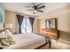 Bright bedroom featuring a ceiling fan and dresser at 2619 Vinings Central Se Dr, Atlanta, GA 30339