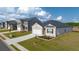 New home community showcasing various house styles and landscaping at 540 Whitman Ln, Stockbridge, GA 30281