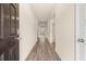 Bright and airy entryway with dark hardwood floors and neutral-colored walls at 540 Whitman Ln, Stockbridge, GA 30281