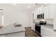 Kitchen with granite countertops, stainless steel appliances, and hardwood floors at 540 Whitman Ln, Stockbridge, GA 30281