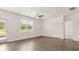 Spacious living room with hardwood floors and door to patio at 540 Whitman Ln, Stockbridge, GA 30281