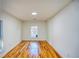 Simple bedroom with hardwood floors and a window at 1760 Detroit Nw Ave, Atlanta, GA 30314