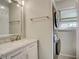 Updated bathroom with white vanity and marble countertop at 3149 Buford Ne Hwy # 7, Atlanta, GA 30329