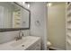 Updated bathroom with white vanity and marble countertop at 3149 Buford Ne Hwy # 7, Atlanta, GA 30329