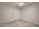 Spacious bedroom with double closets and neutral carpeting at 3149 Buford Ne Hwy # 7, Atlanta, GA 30329