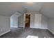 Spacious bedroom with gray carpet and access to other rooms at 3404 Mount Olive Rd, Atlanta, GA 30344