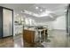 Open concept kitchen features a breakfast bar and modern finishes at 905 Juniper Ne St # 110, Atlanta, GA 30309