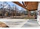 Covered porch with wood beams offering a view of the neighborhood at 860 Gardner Sw St, Austell, GA 30168