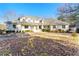 Two story house with white brick exterior and landscaping at 416 Ebenezer Church Rd, Fayetteville, GA 30215