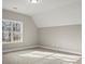 Bright bedroom with large window and neutral decor at 576 Rockwell Sw St, Atlanta, GA 30310