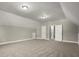 Spacious bonus room with carpet and multiple doors at 576 Rockwell Sw St, Atlanta, GA 30310
