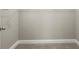 Spacious walk-in closet with wire shelving and neutral carpeting at 576 Rockwell Sw St, Atlanta, GA 30310
