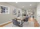 Bright dining room with a farmhouse style table and seating for four at 576 Rockwell Sw St, Atlanta, GA 30310