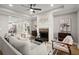 Open concept living room with hardwood floors and a view of the dining area at 576 Rockwell Sw St, Atlanta, GA 30310