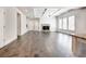 Spacious living room with hardwood floors and stone fireplace at 3730 Sierra Lake Dr, Cumming, GA 30040