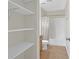 Clean bathroom with shower/tub combo and storage shelves at 1031 State Nw St # 103, Atlanta, GA 30318