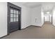 Clean and well-lit hallway with carpeted floors at 1031 State Nw St # 103, Atlanta, GA 30318