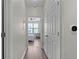 Hallway with doors to bedrooms and a view of bedroom at 400 17Th Nw St # 2218, Atlanta, GA 30363