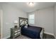 Bedroom with nightstand and full bed at 511 Forest Ln, Canton, GA 30114