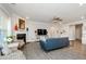 Spacious living room with a fireplace and large windows letting in sunlight at 511 Forest Ln, Canton, GA 30114