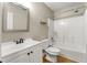 Clean bathroom with white vanity, tub and mirror at 3361 Highway 3 N, Hampton, GA 30228