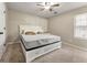 Main bedroom with a king-size bed and built-in drawers at 3361 Highway 3 N, Hampton, GA 30228