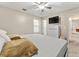 Spacious main bedroom with a king-size bed and a view of the hallway at 3361 Highway 3 N, Hampton, GA 30228