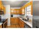 Bright kitchen with light wood cabinets and granite countertops at 3361 Highway 3 N, Hampton, GA 30228