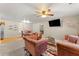 Spacious living room featuring plush sofas and a large TV at 3361 Highway 3 N, Hampton, GA 30228