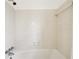 Clean bathroom with shower/tub combo and neutral tile at 3937 Ashford Dunwoody Ne Rd, Brookhaven, GA 30319