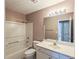 Bathroom with shower/tub combo and vanity at 1291 Low Water Way, Lawrenceville, GA 30045