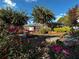 Landscaped backyard oasis with a relaxing patio and beautiful flowers at 1625 Conley Rd # 229, Conley, GA 30288