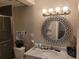 Updated bathroom with marble vanity and large mirror at 1625 Conley Rd # 229, Conley, GA 30288