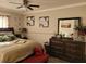 Spacious bedroom with a king-size bed, dresser, and large mirror at 1625 Conley Rd # 229, Conley, GA 30288