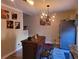 Open concept kitchen with breakfast bar and stylish light fixture at 1625 Conley Rd # 229, Conley, GA 30288