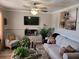 Living room with a neutral color palette, fireplace and comfy seating at 1625 Conley Rd # 229, Conley, GA 30288