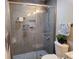 Clean and modern shower with grey tile and glass enclosure at 1625 Conley Rd # 229, Conley, GA 30288