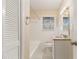 Clean bathroom, granite countertop, and updated fixtures at 2702 Norma Cir, Decatur, GA 30034