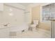 Bathroom with a large soaking tub and updated flooring at 2702 Norma Cir, Decatur, GA 30034