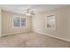 Bright bedroom with neutral carpeting and large windows at 2702 Norma Cir, Decatur, GA 30034
