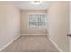 Spacious bedroom with neutral walls and plush carpeting at 2702 Norma Cir, Decatur, GA 30034