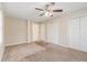 Bright bedroom featuring ceiling fan and ample closet space at 2702 Norma Cir, Decatur, GA 30034