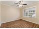 Spacious bedroom with hardwood floors and large window at 2702 Norma Cir, Decatur, GA 30034