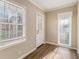 Bright office space with neutral walls, wood flooring, and large windows at 2702 Norma Cir, Decatur, GA 30034