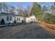 Updated white exterior, landscaping, and a walkway leading to the front door at 3042 Castleton Way, Marietta, GA 30062