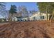 Newly renovated home with a large yard and mature trees at 3042 Castleton Way, Marietta, GA 30062