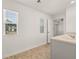 Bright bathroom with tiled floor and a view at 145 Bonito Trl, Covington, GA 30016